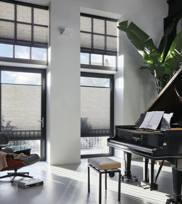 Motorised Luxaflex blinds on tall windows controlled by PowerView