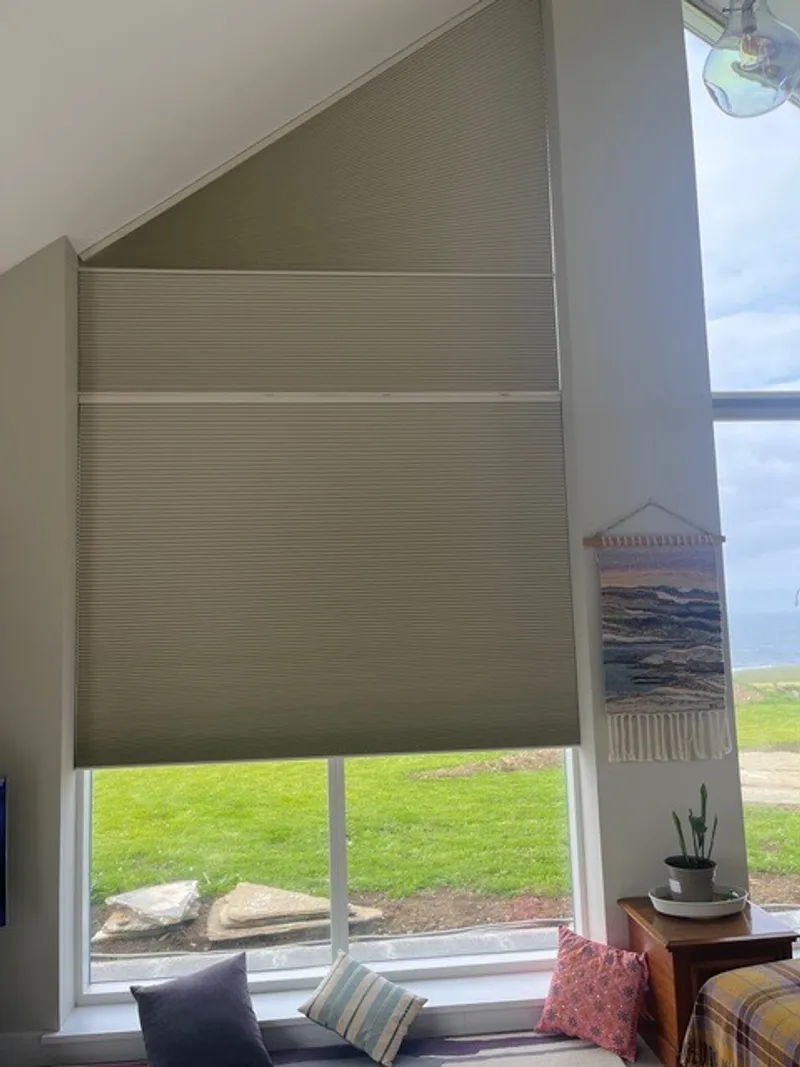 Motorised Duette blind with sea view, self-installed on Orkney