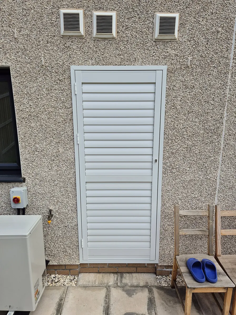 External aluminium shutters on a property